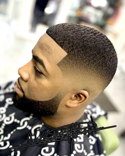 Skin fade & barbe — coupe réalisée au salon